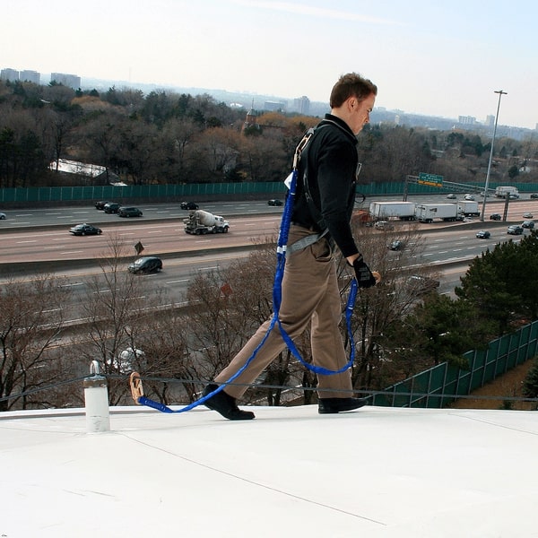 worker using a horizontal lifeline (HLL) system for fall protection